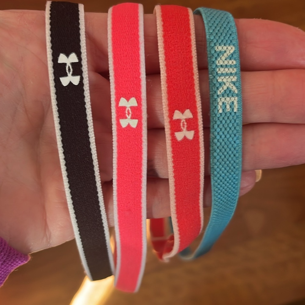 4 like new condition under Armour/Nike athletic headbands